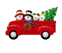 Picture of Couple in Red Truck with 2 kids